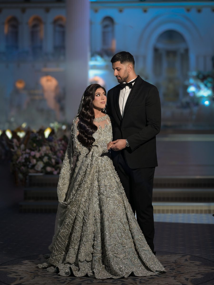 Bride and groom at an evening venue — original