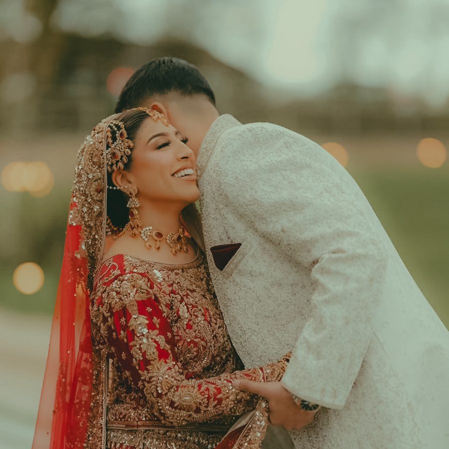 Bride and groom embracing at a wedding